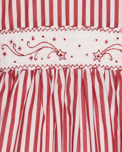 Red and white striped fabric with embroidered patterns