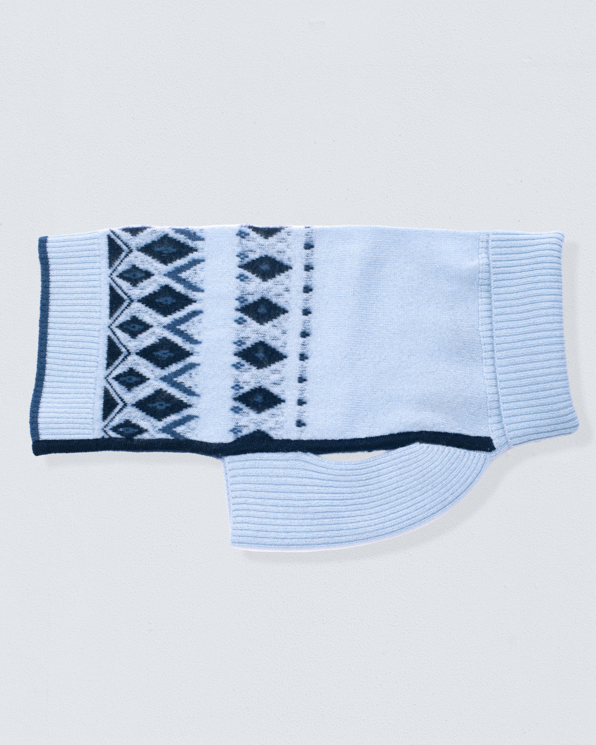Sky blue colored dog sweater with jacquard design diamond shapes and chevrons