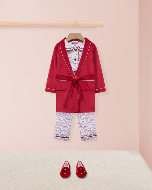 Red robe and lougewear set with matching shoes on a pink background