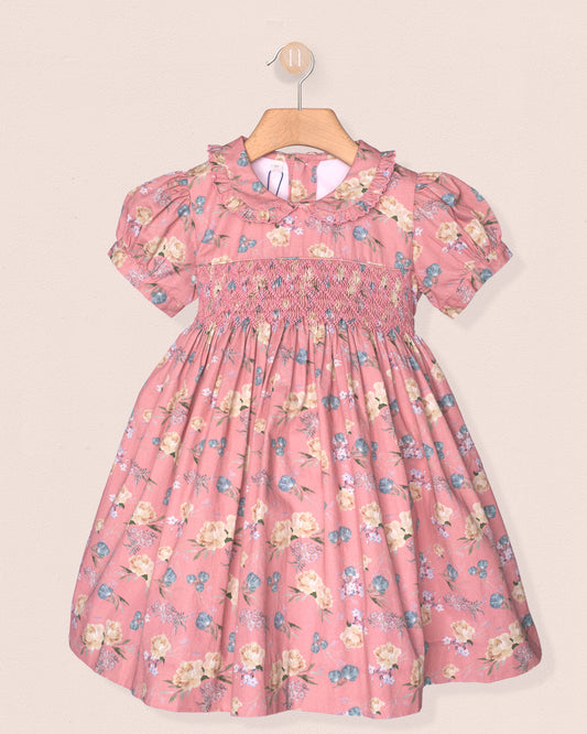 Pink floral dress on a beige background