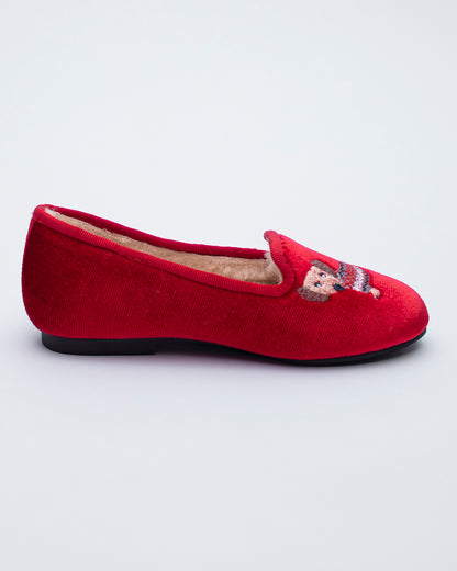 Red slipper with a dog design on a white background