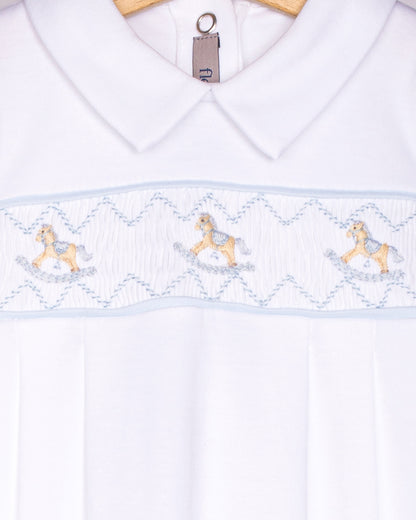 White shirt with embroidered horse design on a hanger