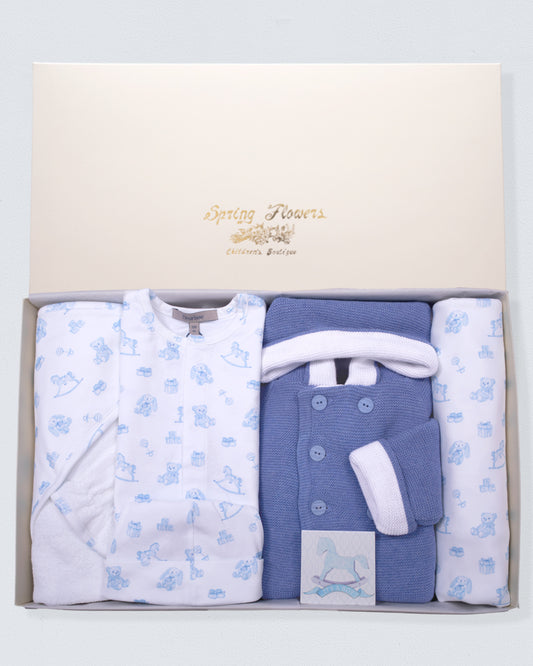 Baby clothing set with blue and white patterns in a gift box labeled 'Spring Flowers'.