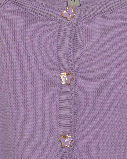 Close-up of a purple garment with gold butterfly embellishments.