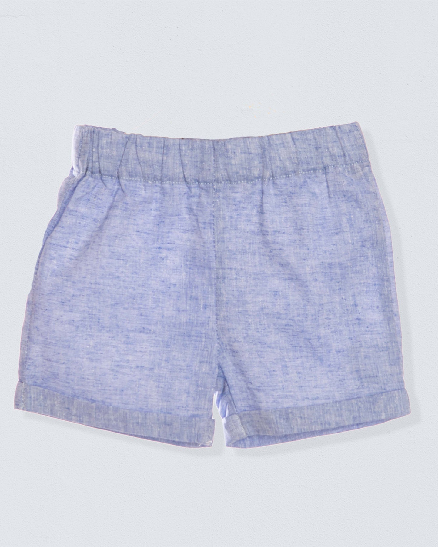 Blue shorts on a light gray background
