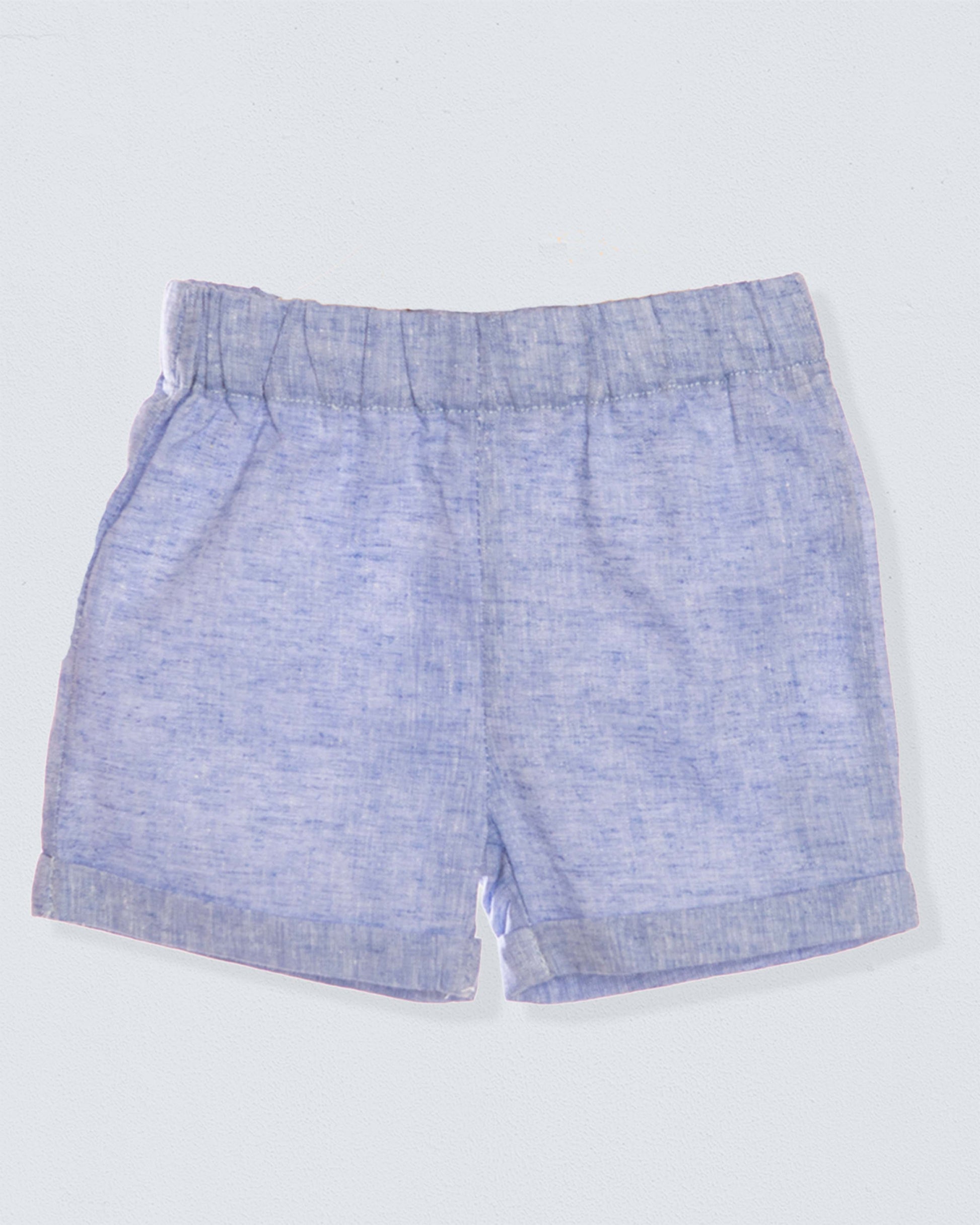 Blue shorts on a light gray background
