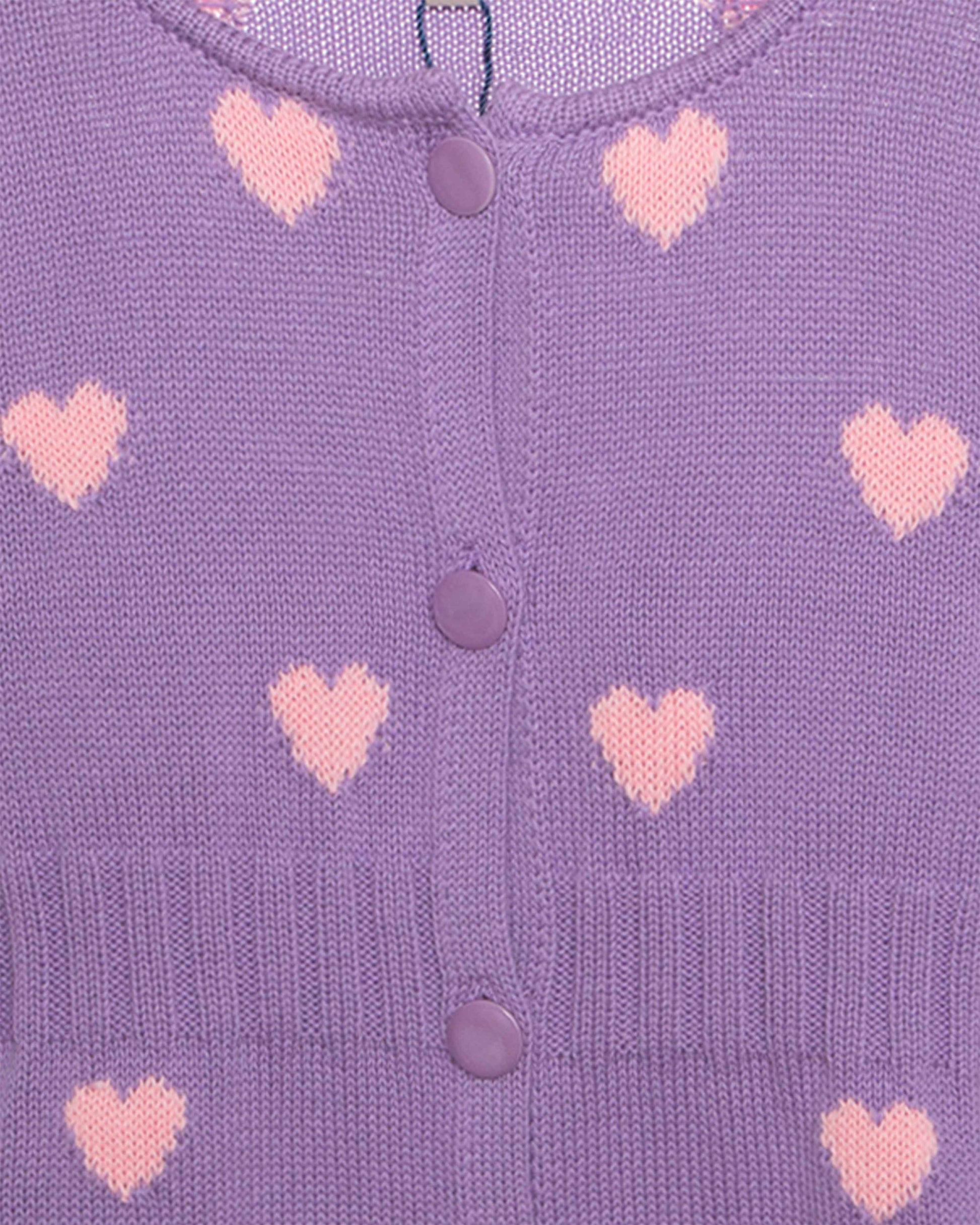 Purple cardigan with pink heart patterns and buttons