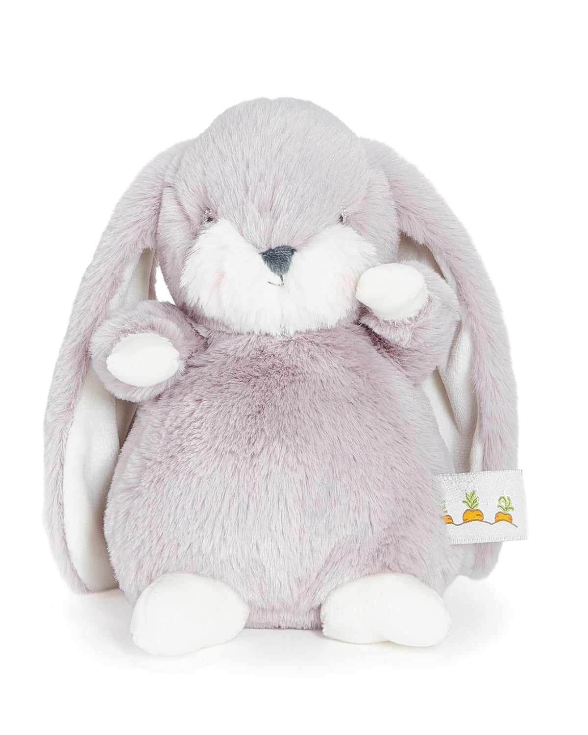 Plush toy rabbit with a tag on a white background