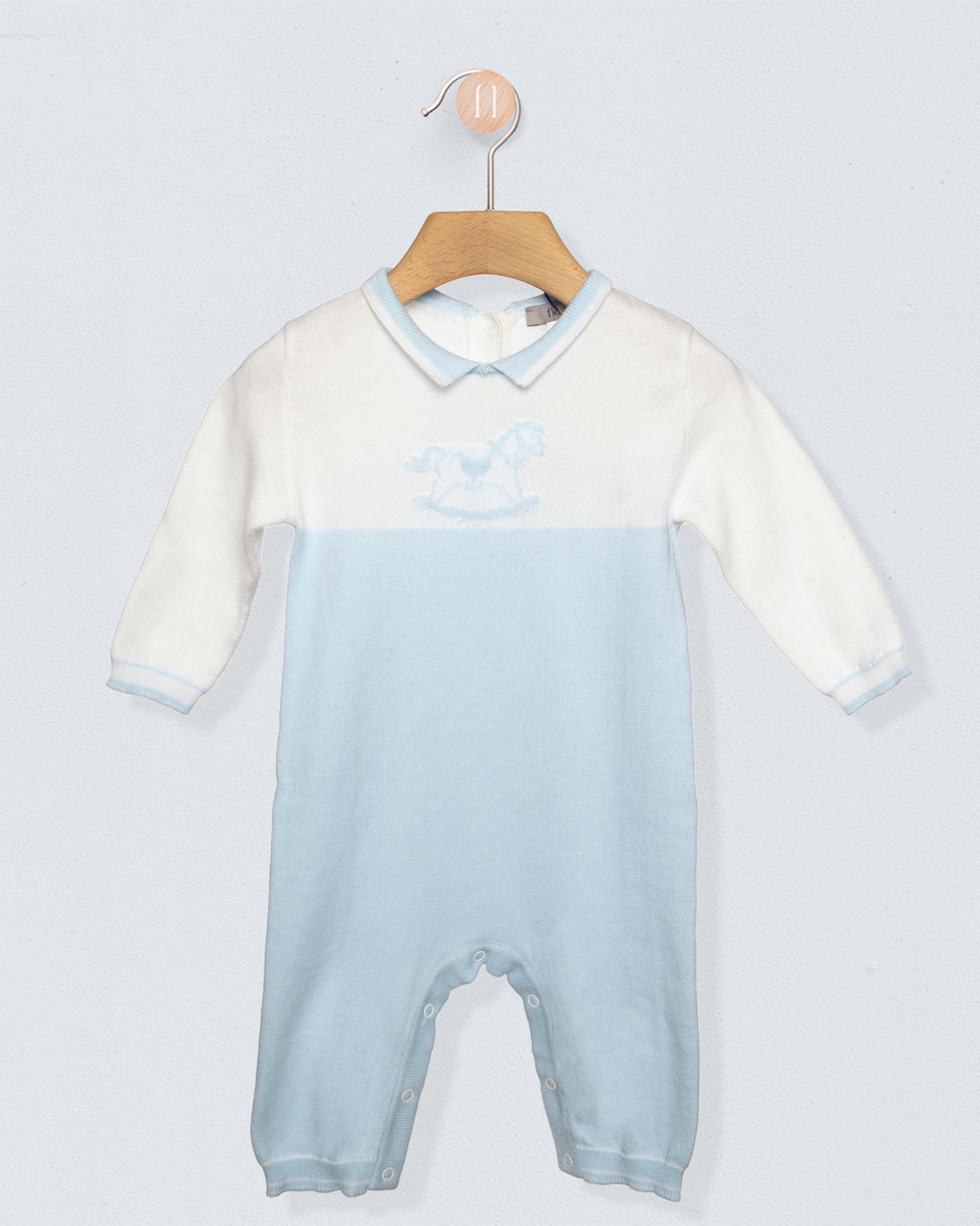 Long sleeved romper with white on top, light blue from the torso through the legs, with a blue collar and a horse design on chest, against a grey background