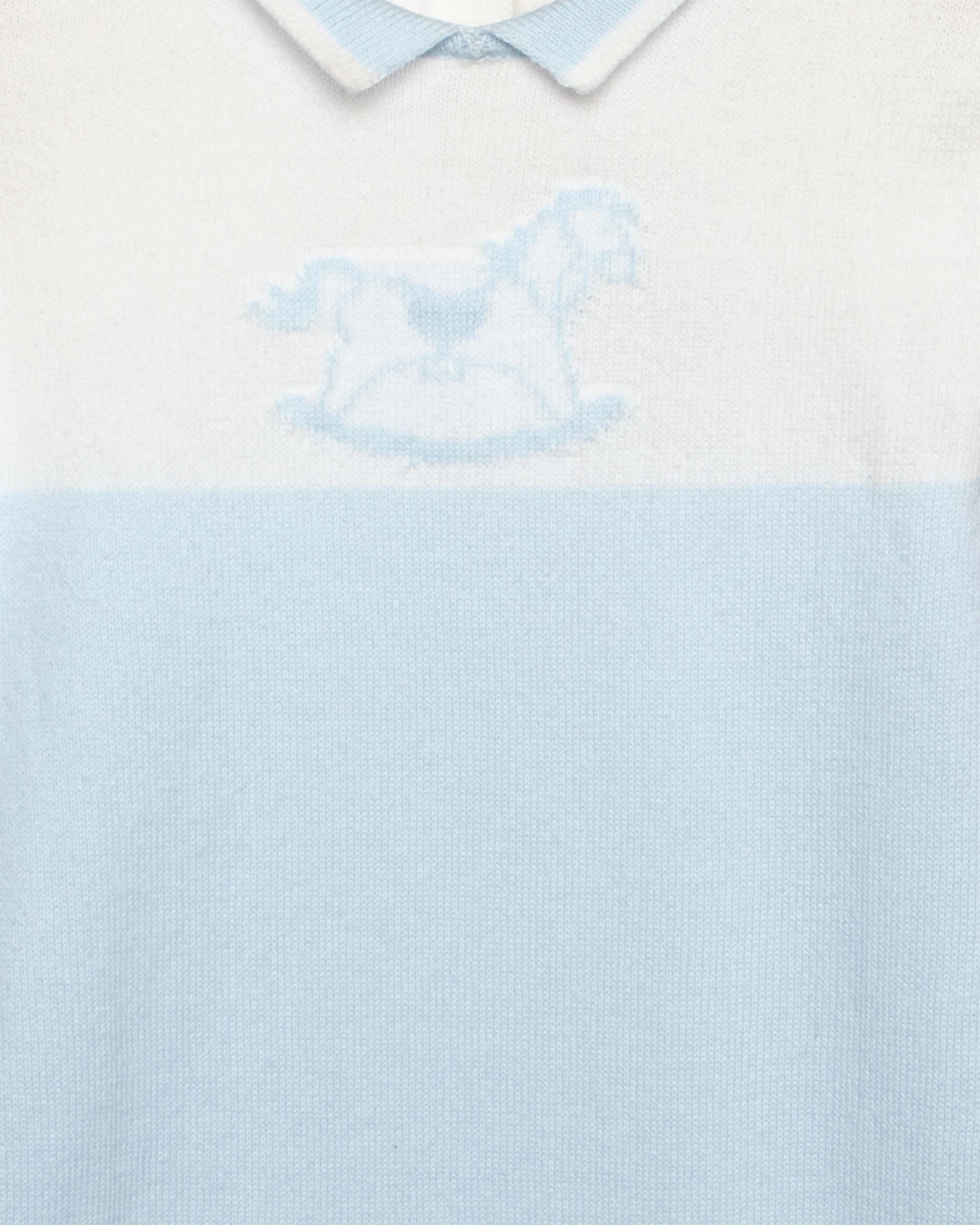 Zoom closeup of light blue and white romper, with a horse design and collar