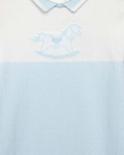 Zoom closeup of light blue and white romper, with a horse design and collar