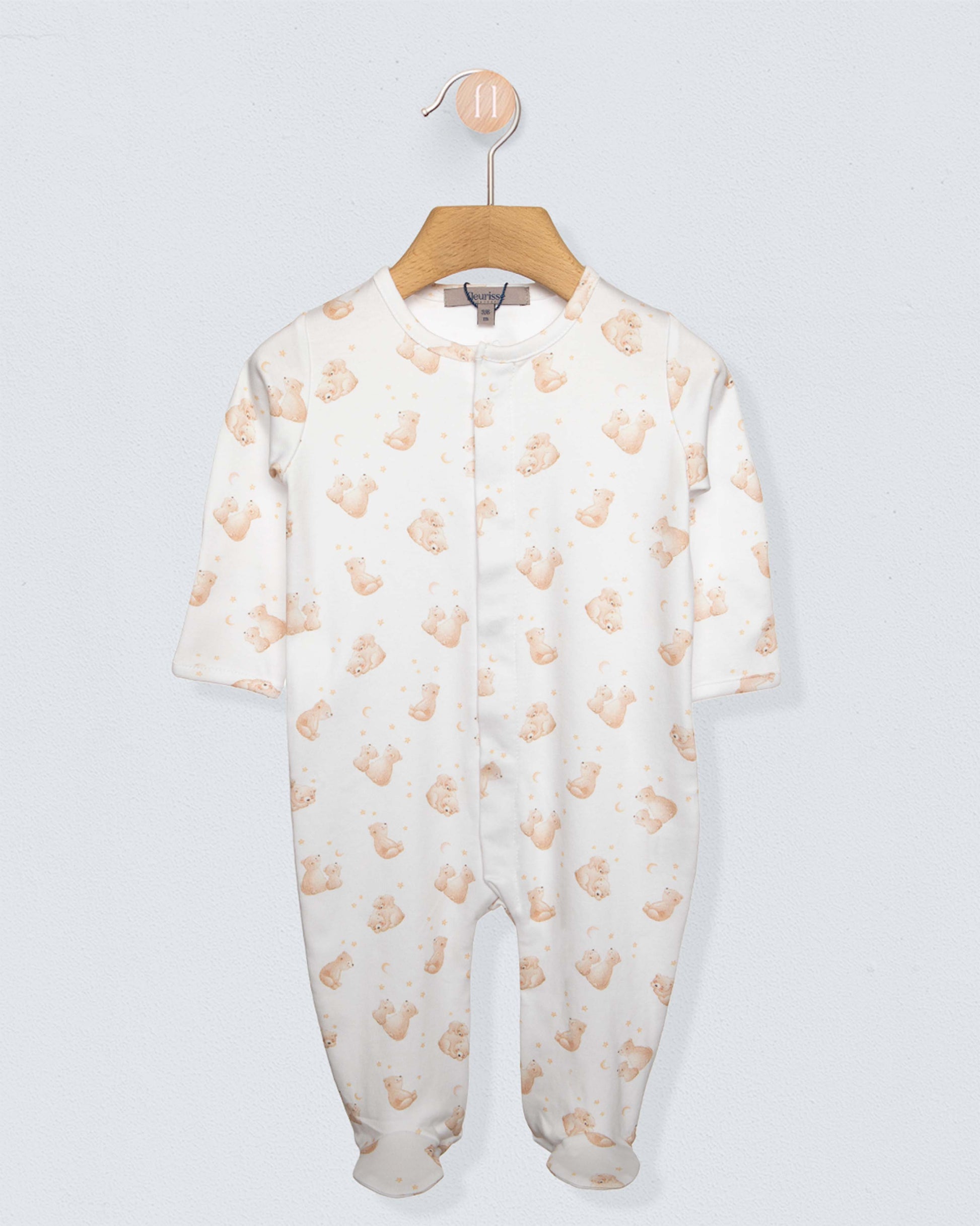 White stretchie with brown bears on a grey background 