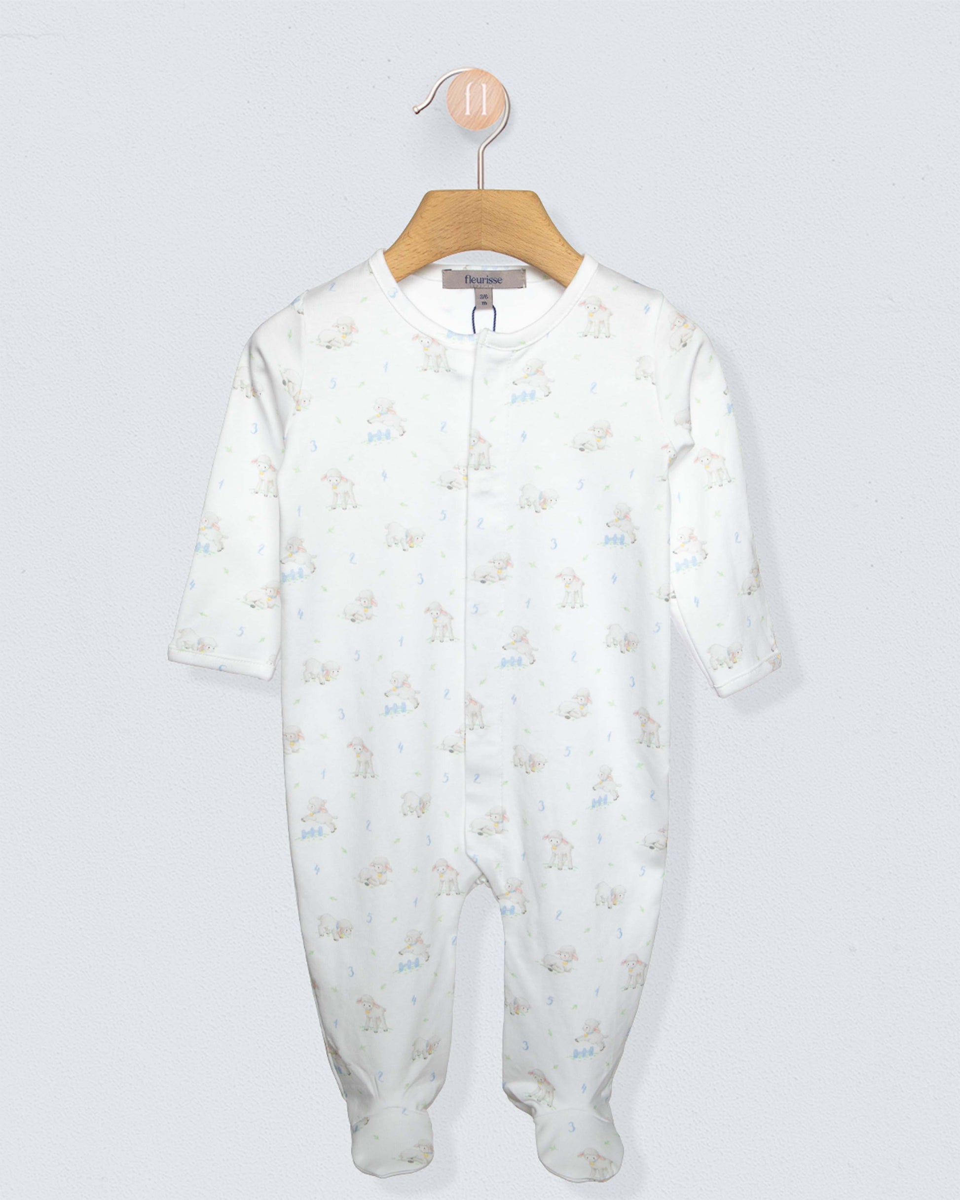white stretchie with white blue and brown sheep designs, against a white background