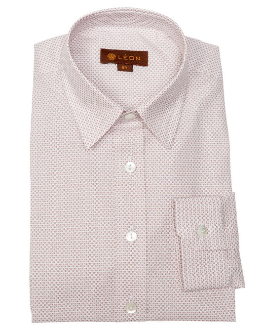 Boy's dress shirt folded on a white tabletop, with red square design pattern, long sleeve with colars and clear buttons.