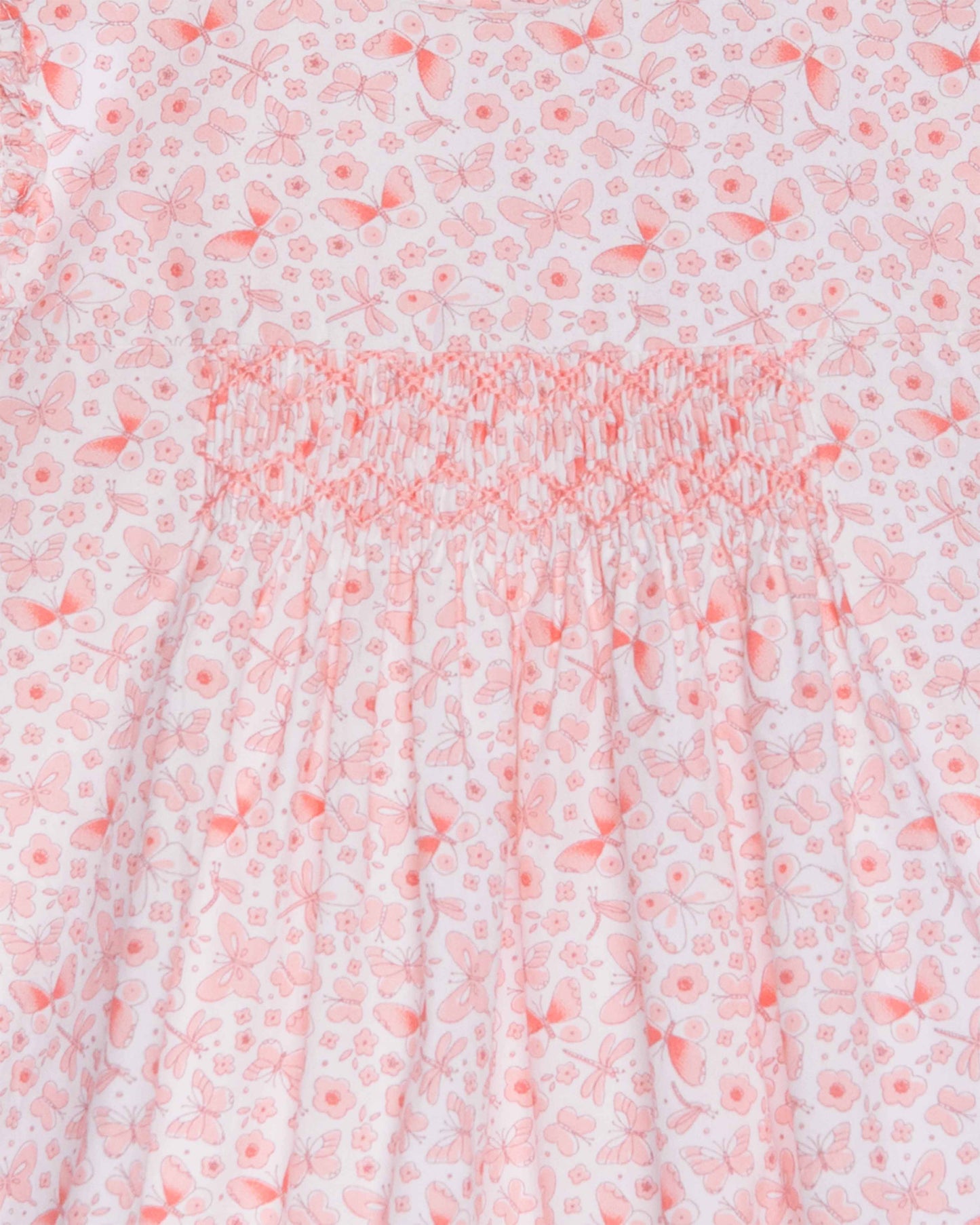 Floral patterned fabric with a pink and white color scheme