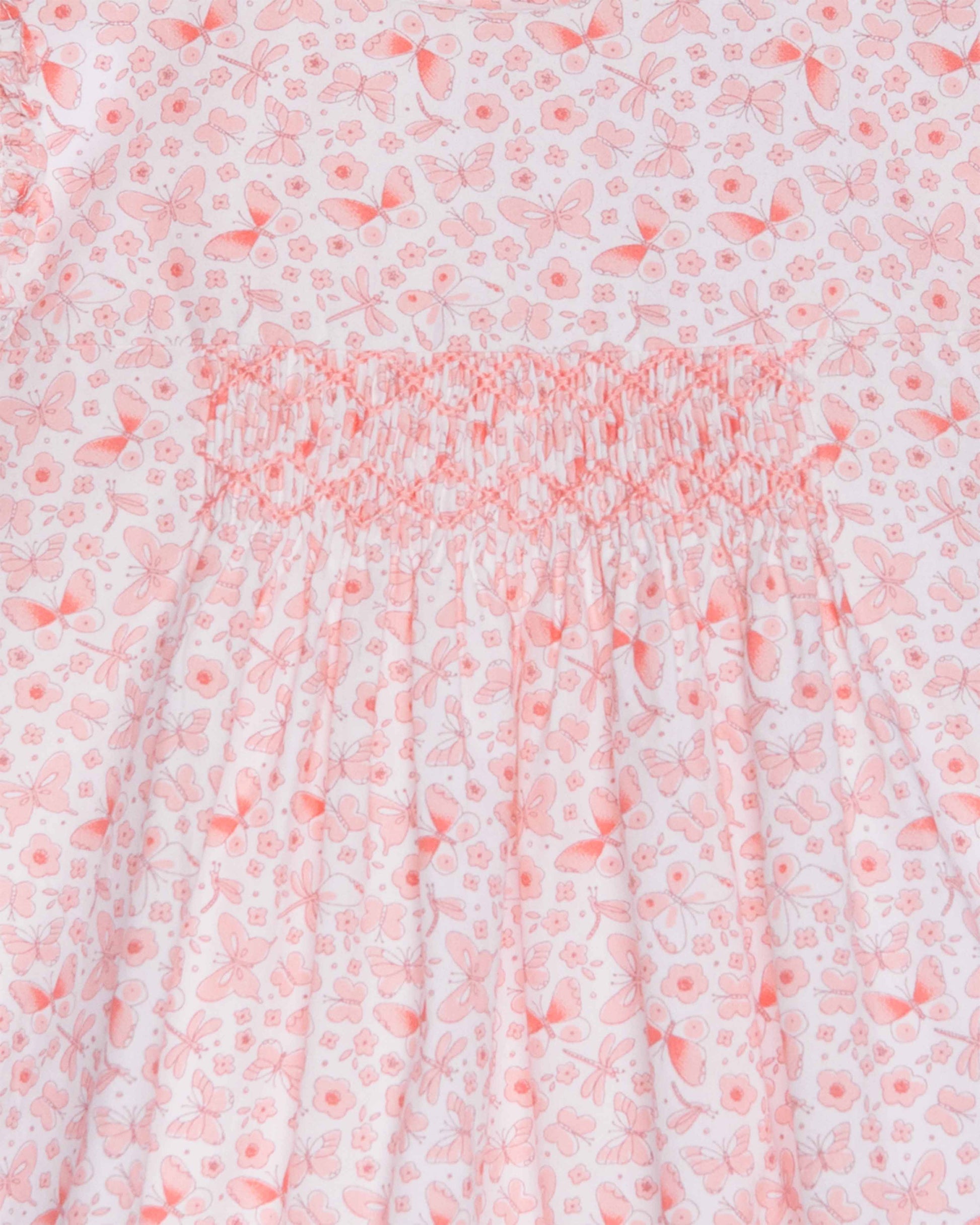 Floral patterned fabric with a pink and white color scheme