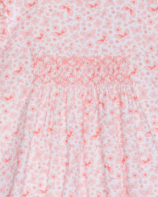 Floral patterned fabric with a pink and white color scheme