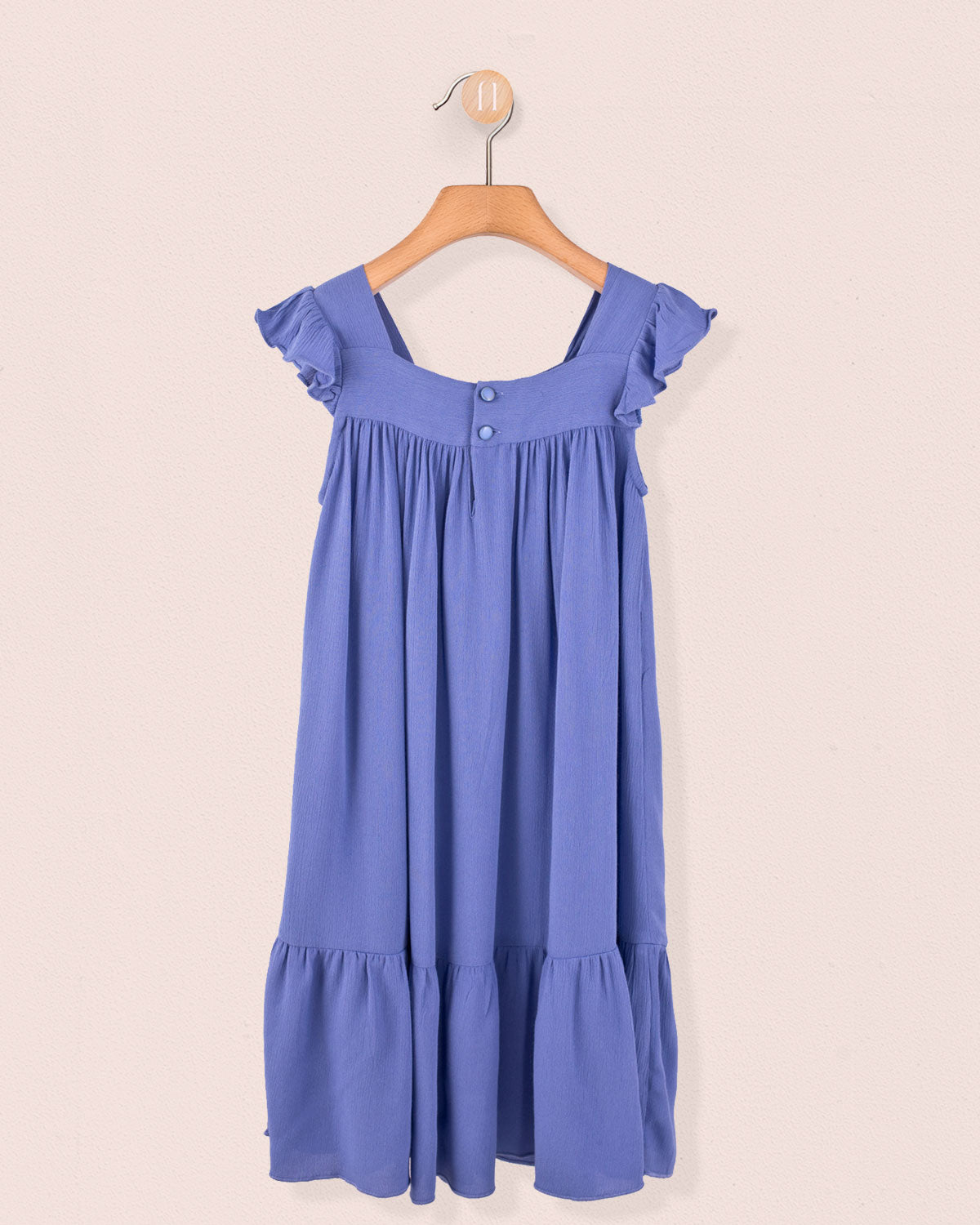 Back view of slate girl's dress showing tonal buttons and gathered detailing