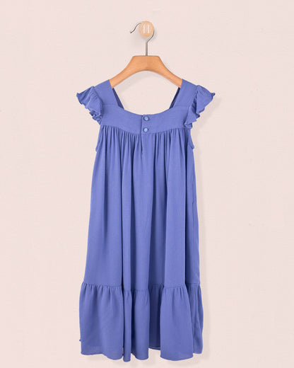 Back view of slate girl's dress showing tonal buttons and gathered detailing