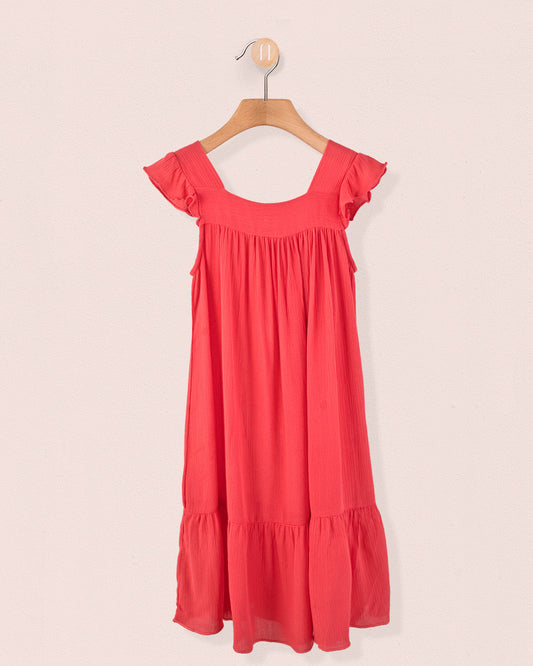 Coral flutter-sleeve viscose dress with ruffled hem, displayed on hanger against light pink background