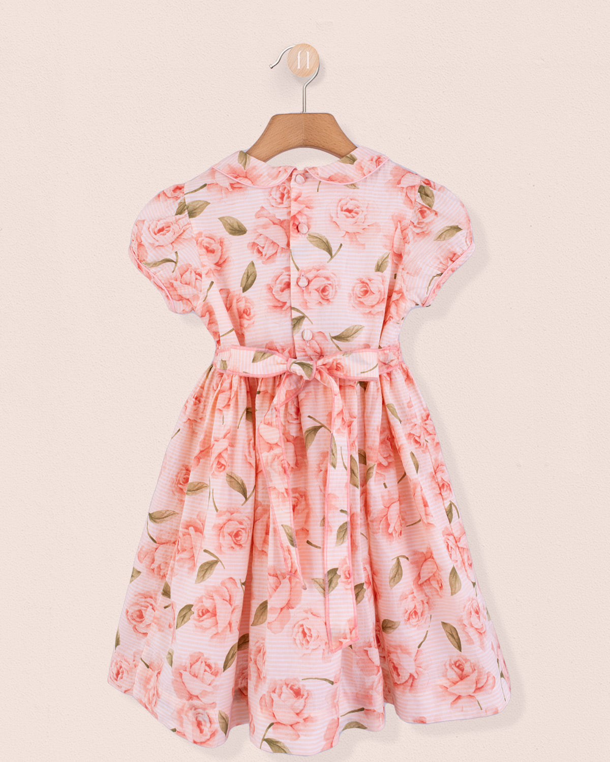 Back view of Amanda Bianca rose smock dress with coordinating sash