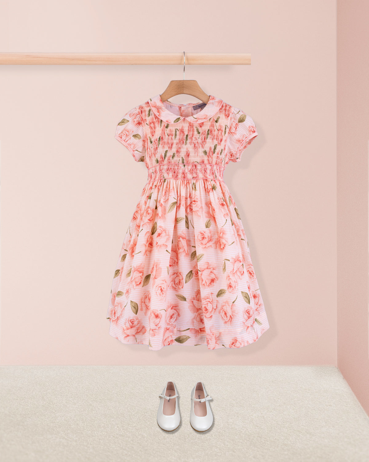 Amanda Bianca rose smock dress styled with cream Mary Jane shoes