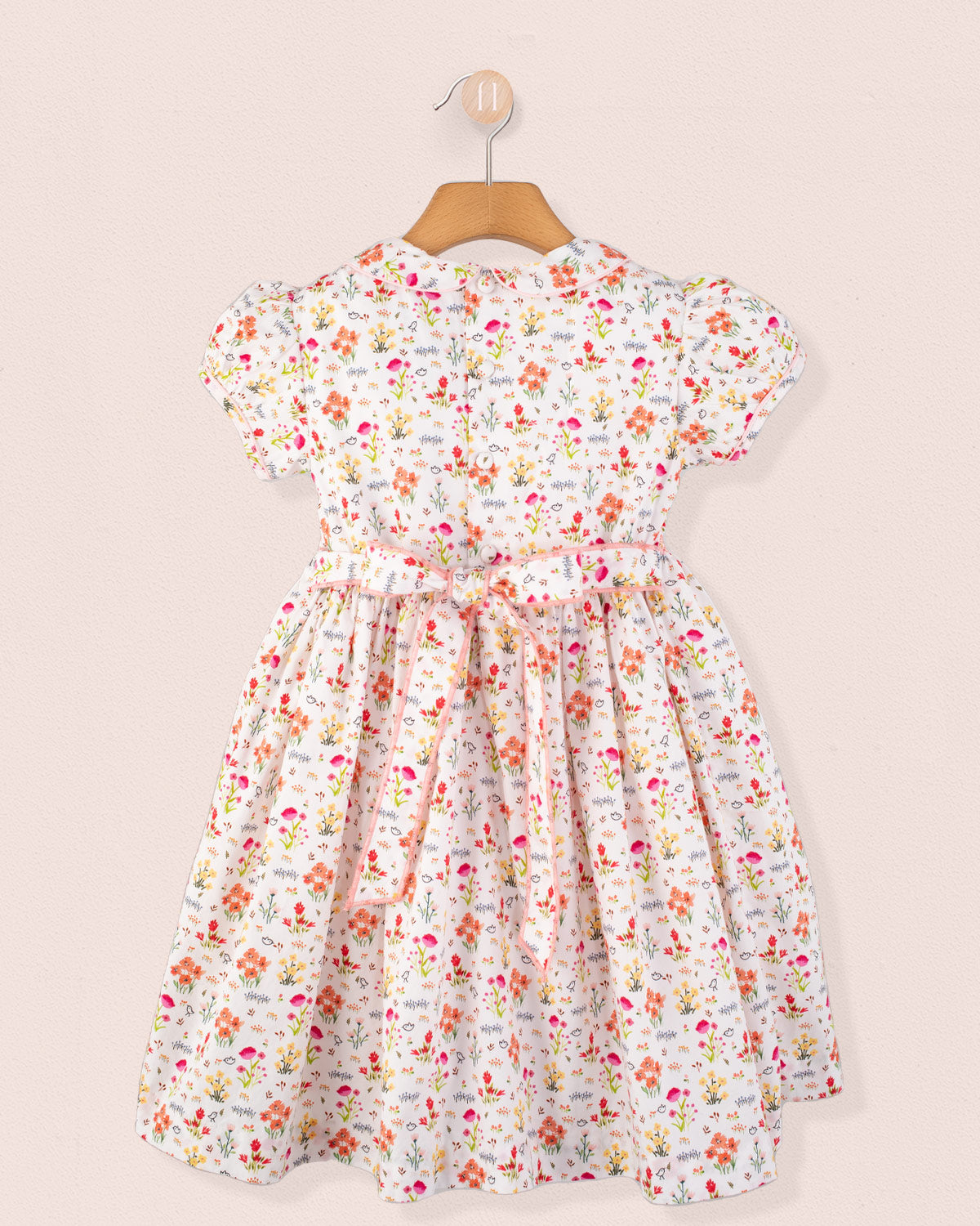 Amanda Happy Garden Smocked Dress back view showing sash tie and floral pattern