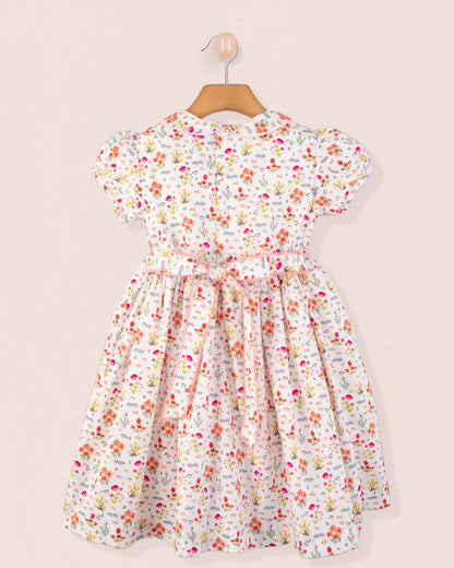 Amanda Happy Garden Smocked Dress back view showing sash tie and floral pattern