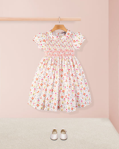 Amanda Happy Garden Smocked Dress styled with white shoes