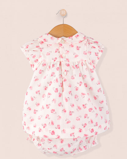 Back view of the Baby Eva Versaille Rose Octuouse dress set on a hanger, highlighting button closure and coordinating diaper cover.