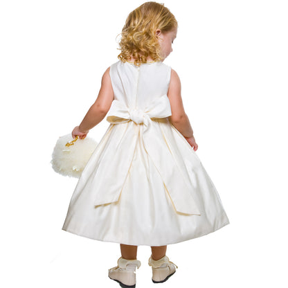 Caroline Cream Faille Gown - DressGirl turned to the back, looking down, wearing Caroline Cream Faille Gown showing the back of the dress