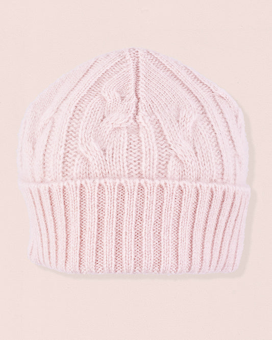 Cashmere Pink Cable Knit Hat with a folded ribbed brim and textured pattern, made from soft Italian cashmere for cozy winter wear.