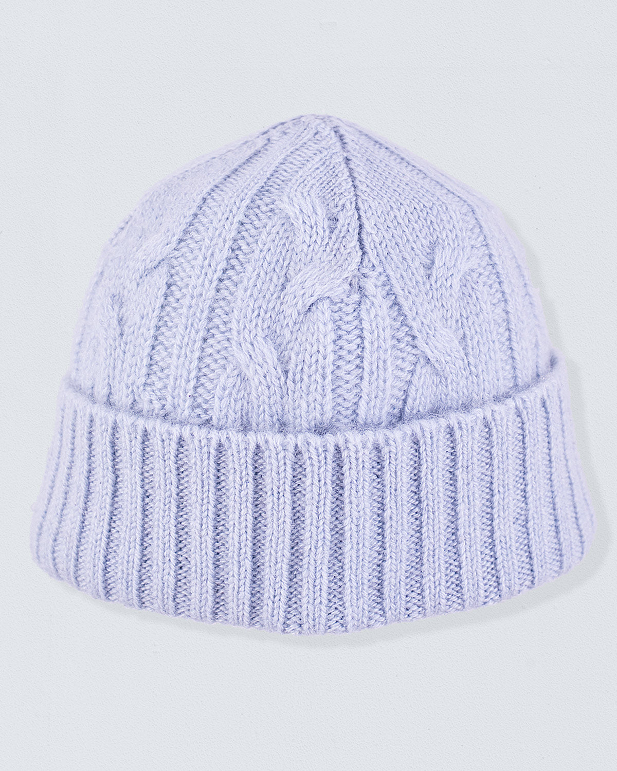 Cashmere Blue Cable Knit Hat, featuring a folded ribbed cuff and classic cable knit pattern, crafted from soft Italian cashmere for cozy winter comfort.