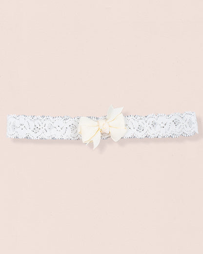 White lace baby headband with ivory grosgrain bow