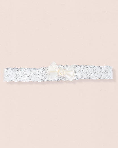 White lace baby headband with cream satin bow