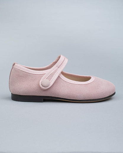 Side profile of a single Elizabeth Pink Suede Mary-Jane shoe showing velcro strap and soft suede texture.