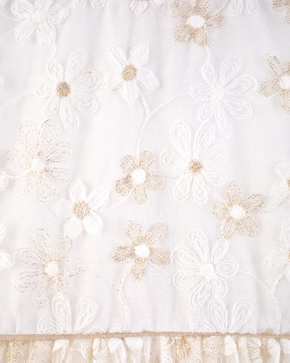 Close-up of floral embroidery on Baby Isodora Cream Tulle Dress showing fine gold and cream threadwork on mesh fabric.